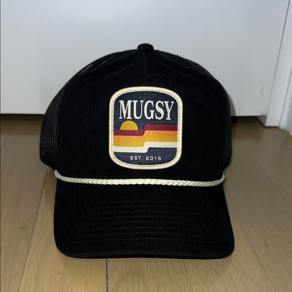 Mugsy Black Trucker Hat with Retro Patch